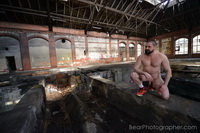 nude man in an abandoned military base