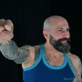Le Corbusier chair LC-01 - tattoed muscle bear photo shoot - strong male photography